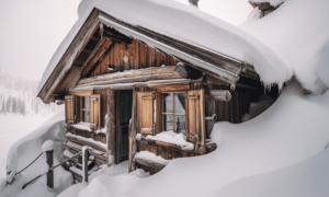 Ambcrypto a wooden cabin half covered in snow after a heavy ava 130afe6d e77a 4259 a5b3 d83c8393e94b 1200x900 1000x600.png