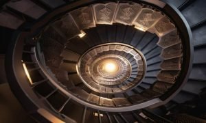 Ambcrypto a spiral staircase with each step leading upward symb 0386077c b36d 41ce 8fba 28c5f08f7134 1000x600.jpg