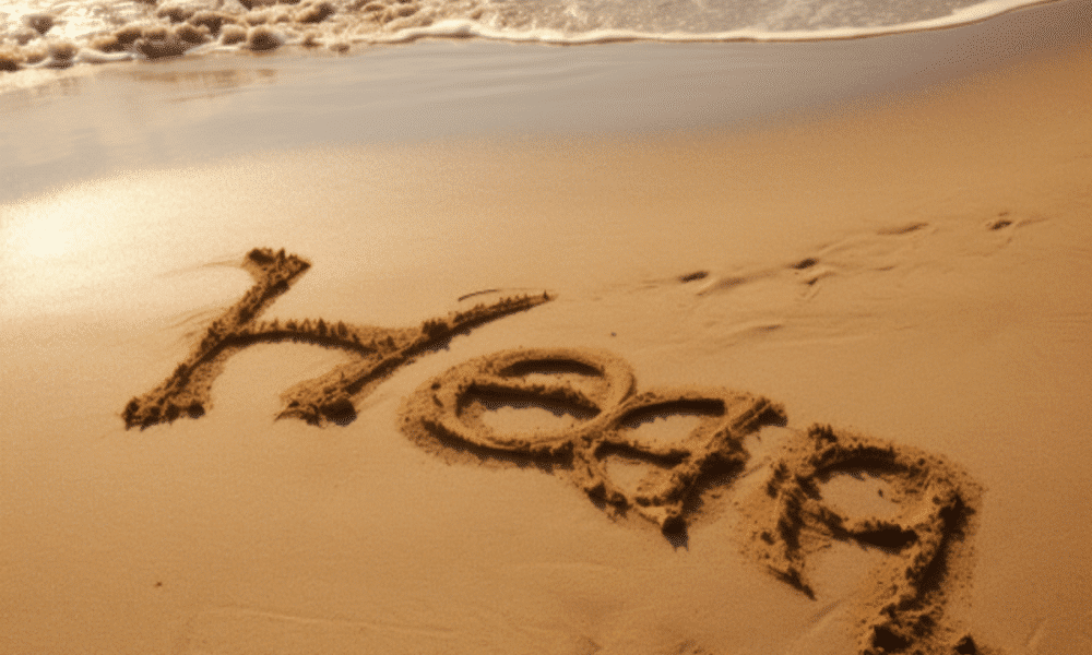 Ambcrypto the word hedera written in sand at a beautiful beach. 417d7427 40e4 49bb a151 252ecdac0352 1200x900 1000x600.png