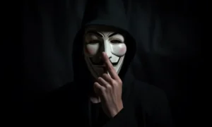Ambcrypto a person wearing anonymous mask with finger on his li d32605c8 e9a6 42a4 b944 d54496282205 1200x900 1000x600.webp.webp